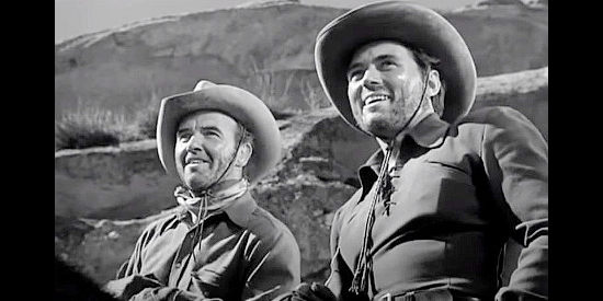 Preston Foster as Scotty Mason and William Bishop as The Kid, catching a glimpse of the wild stallion in Thunderhoof (1948)