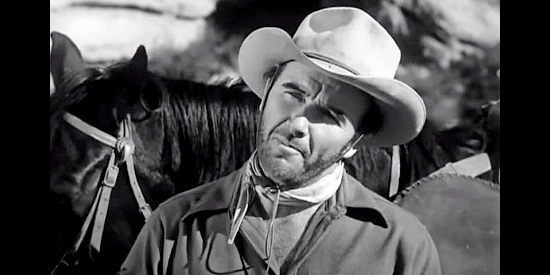 Preston Foster as Scotty Mason, scolding The Kid for referring to Margarita as a 'skirt' in Thunderhoof (1948)