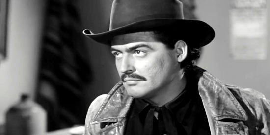 Richard Bartlett as Larry Baker, one of Harold Brecker's henchmen in The Lonesome Trail (1955)