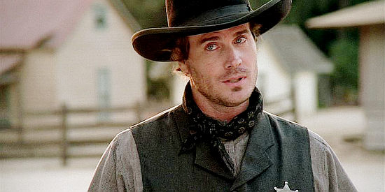 Victor Browne as Sheriff Zach Tyler, offering Missie advice about teenage girl she's adopted in Love's Unending Legacy (2007)