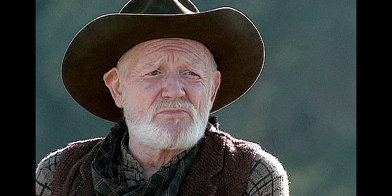 W. Morgan Sheppard as Scottie, one of the cowboys Willie hires to work on the ranch in Love's Long Journey (2005)