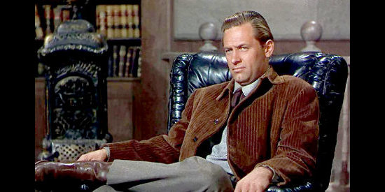 William Holden as Del Stewart learns of Devereaux's plans to marry Caroline in The Man from Colorado (1948)