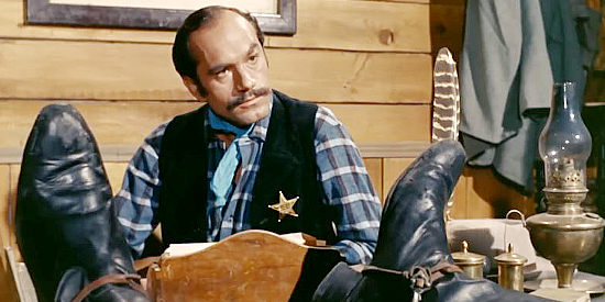 Aldo Sambrell as Sheriff Cox, listening to Black's explanation for his latest shenanigans in Billy the Kid (1964)