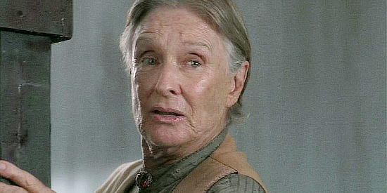 Cloris Leachman as Miss Hattie Clarence, the woman in charge of the orphanage where the cholera outbreak starts in Love Takes Wing (2009)