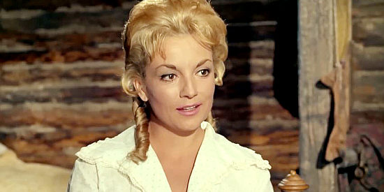 Esther Grant as Marie Carter, Billy's sister, answering questions for the Union captain in Billy the Kid (1964)