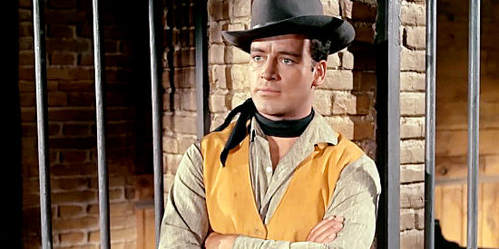 George Martin as Billy Carter, refusing to give up his quest for vengeance, even though locked up in Billy the Kid (1964)