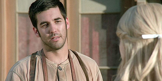 Jordan Bridges as Lee Ownes, the Sikeston blacksmith, smitten with the new doctor in town in Love Takes Wing (2009)