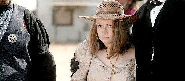 Katie Nelson as Lizzie, the "daughter" Thaddeus Vincent has working in his mine in Bite the Dust (2023) 