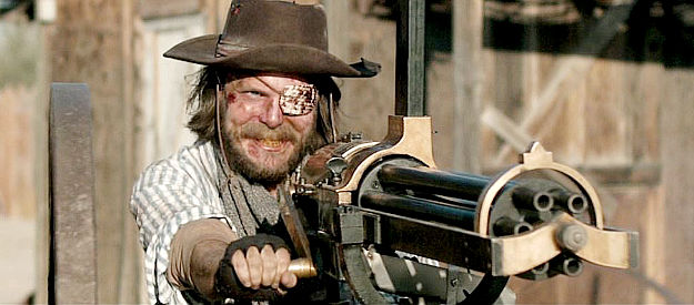 Kellen Garner as Zeke Tyler, an outlaw who finds himself with a Gatling gun in Bite the Dust (2023)