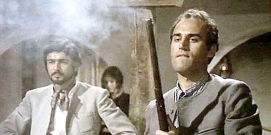 Manuel de Blas as Rafael with Maximo Valverde as Ramon looking on in Trinity Sees Red (1970)