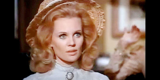Pamela Austin as Betsy Potter, the bank customer who changes Evil Roy's life with a single kiss in Evil Roy Slade (1972)