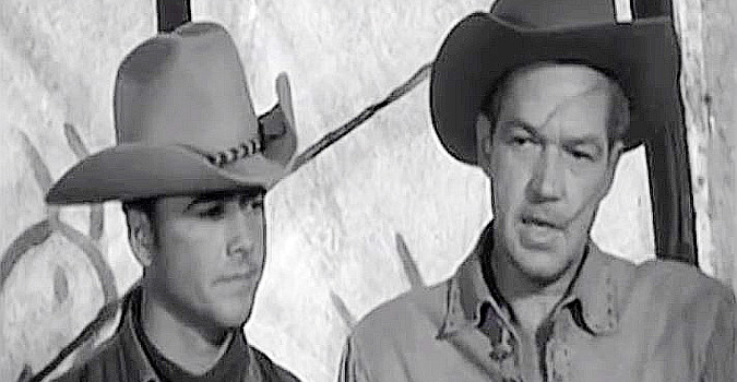 Dickie Jones as Mike McGeehee and Bill Williams as Jim Henry, bearing whip scars, address the Arapahoe chiefs in The Wild Dakotas (1956)