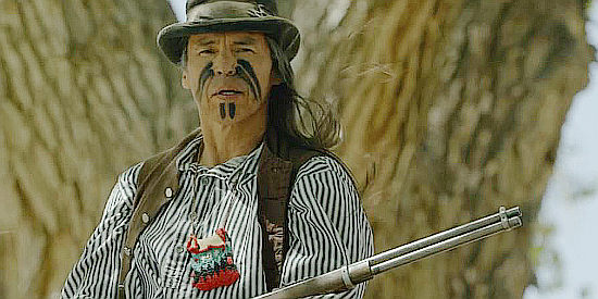 David Midthunder as Lobo, Nora's Apache friend in Two Sinners and a Mule (2023)