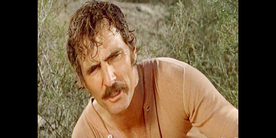 Dennis Weaver as Deke Chambers, finding himself under a young boy's rifle in Female Artillery (1973)