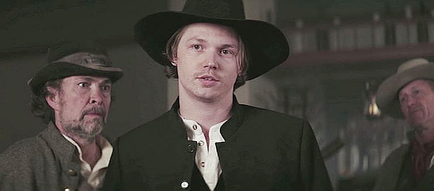 Jack Kilmer as Jean Jaques Renau, aka Reno, meeting Mayor Bishop for the first time in Dead Man's Hand (2023)