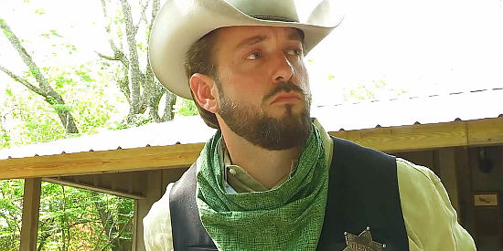 James H. Keating as Sheriff Dalton Stone, about to confront a bounty hunter in Vernon (2021)