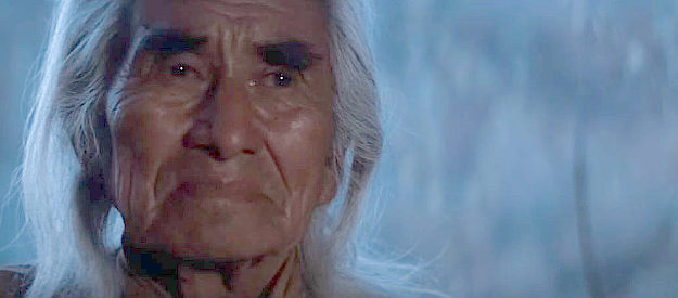 Chief Dan George as Lone Watie, watching Josey Wales prepare to ride off in The Outlaw Josey Wales (1976)