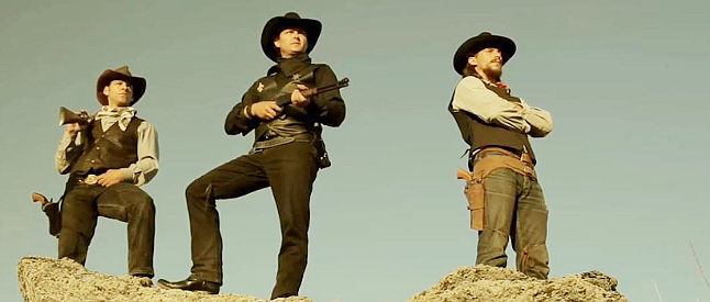 Sheriff Hoffman and his men, planning their next move in Unforgiven True Grit (2023)