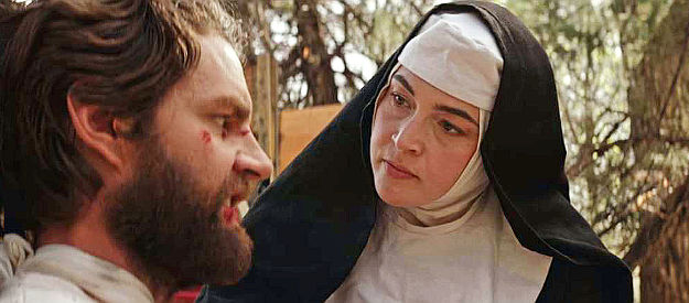Tiffany Cornwell as Hildegard, trying to nurse a stubborn Weston (Daniel Bielinski) back to health in Sanctified (2022)