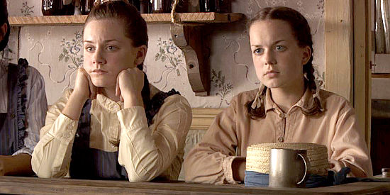 Abigail Mavity as Cassie Barlow and her best friend Rose (Steffani Brass), wondering if there's about to be a change in Ellen's romantic life in Love Begins (2010)