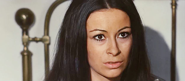 Cristina Iosani as Carmencita, Marcos's passion flower, trying to explain how she wound up in bed with Sartana in Sartana Kills Them All (1970)