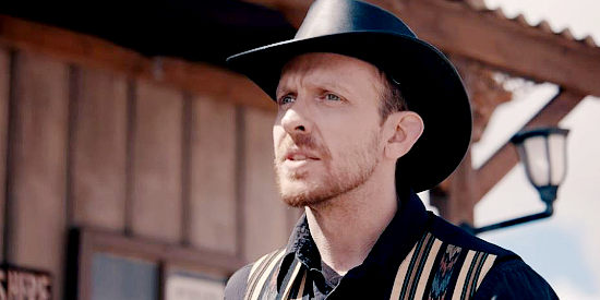 Eric Michaelian as Owen Clark as a confused sheriff preparing for the arrival of two killers in Deadly Western (2023)
