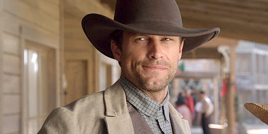 Greg Vaughan as Sheriff Aaron Davis, welcoming his grieving sister into his home in Love's Christmas Journey (2011)