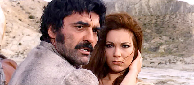 Guglielmo Spoletini (William Bogard), getting a little too frisky with Maria (Maria Silva) for Sartana's liking in Sartana Kills Them All (1970)