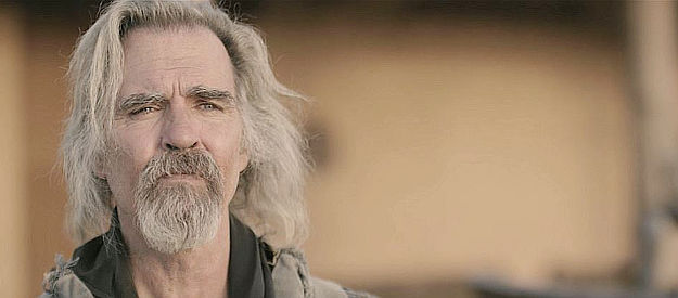 Jeff Fahey as Angel, contemplating a final mission for the Terrors of the Territories in Among Wolves (2023)