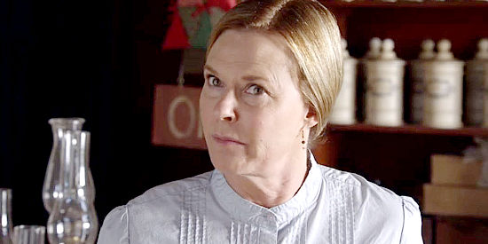 JoBeth Willaims as Mrs. Beatrice Thompson, the shop owner whose advise Ellie Davis often relies on in Love's Christmas Journey (2011)