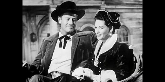 Joel McCrea as Rick Nelson and Yvonne De Carlo as Adelaide McCall, growing closer in The San Francisco Story (1952)