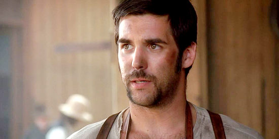 Jordan Bridges as blacksmith Lee Owens, fearing his adopted daughter is growing up too fast in Love Finds a Home (2009)