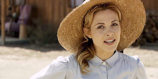 Julie Mond as Ellen Barlow, a single woman trying to run a farm with the help of younger sister Cassie in Love Begins (2010)