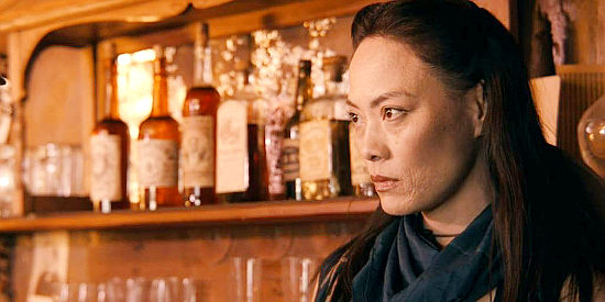 Linda S. Wong as Stella, the saloon owner determined to protect her property in Deadly Western (2023)
