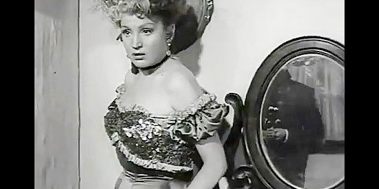 Lis Rogi as Josette, the saloon singer, reacting to The Coyote's orders that she leave town in The Coyote (1955)