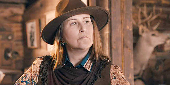 Lorrie Bacon as Beth, the sheriff's wife, learning he's lost his memory in Deadly Western (2023)