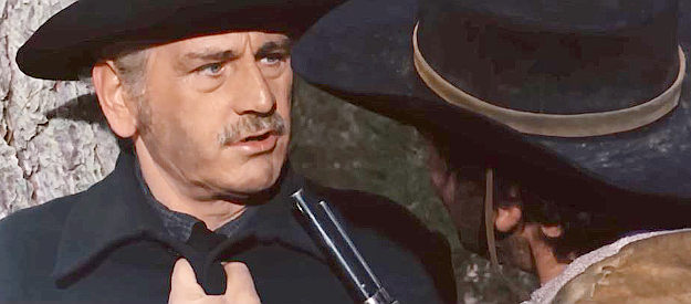 Luis Induni as Sheriff Lawton, the lawman forever on the trail of Sartana and Marcos in Sartana Kills Them All (1970)