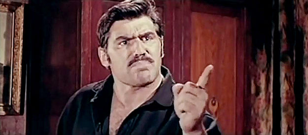 Mario Adorf as Abel Dragna, accusing Jess Kinley of turning on him five years earlier in Sunscorched (1965)