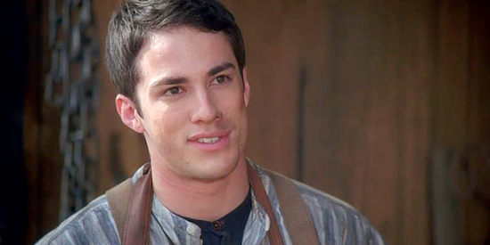 Michael Trevino as Joshua, the blacksmith intern who takes a liking to Lillian Owens in Love Finds a Home (2009)