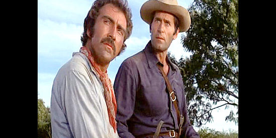 Pedro Armendariz Jr. as Simon Fuegus and Clint Walker as Jack Rutherford, drawing nearer to the U.S. border in Hardcase (1972)