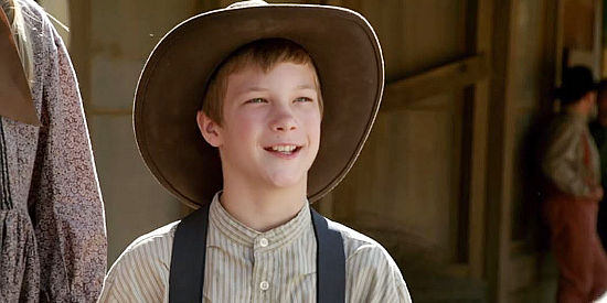 Ryan Wynott as Christopher Davis, the sheriff's son in Love's Christmas Journey (2011)