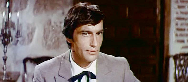 Simon Andreu as Stuart, lying about his real reason for leaving his father's ranch in I Do Not Forgive ... I Kill! (1968)