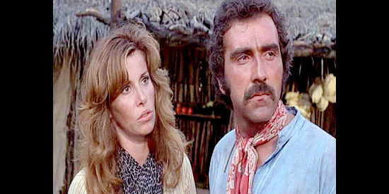Stefanie Powers as Rozaline and Pedro Armendariz Jr., discussing how to deal with Jack Rutherford's return in Hardcase (1972)