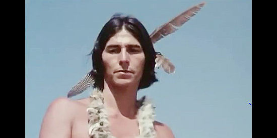 The Indian chief who keeps a watchful eye on Potato Frizt in Montana Trap (1976)