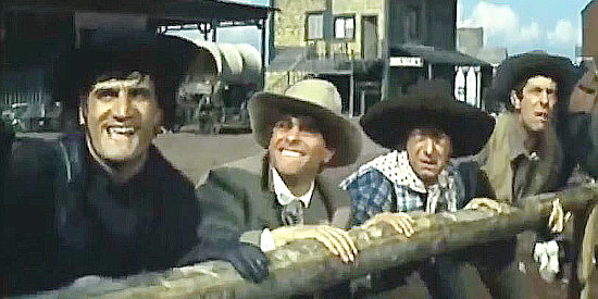The four brutes, frightened by gunfire as they arrive in town in The Magnificent Brutes of the West (1964)