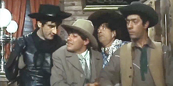 The four brutes turned undertakers preparing for a wagon ride to Fresno in The Magnificent Brutes of Texas (1964)