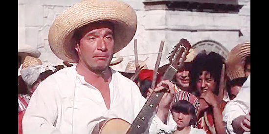 Ugo Tognazzi as Domingo, better at playing music then leading a revolution in The Magnificent Three (1961)