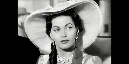 Yvonne De Carlo as Adelaide McCall, torn between her affection for Andrew Cain and Rick Nelson in The San Francisco Story (1952)