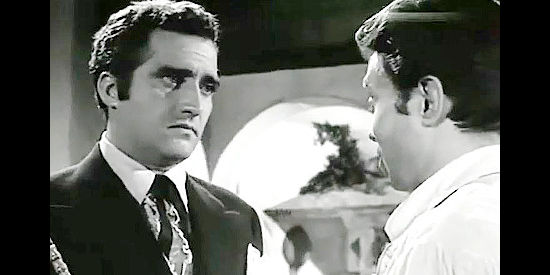 Abel Salazar as Cesar de Echague, enlisting the help of Ricardo to help Lenor at her trial in Judgement of Coyote (1956)