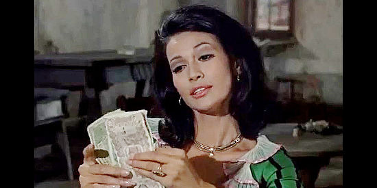 Barbara Luna as Meriden, counting her dollars after a poker match in Winchester '73 (1967)
